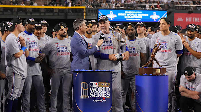 Bruce Bochy with the World Series trophy.